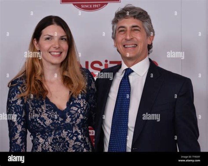 Director Alexander Payne and his wife, Greek philologist Maria Kontos attend the premiere of his new