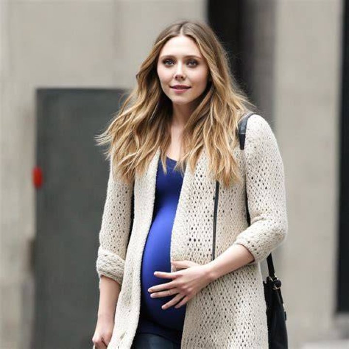 Elizabeth Olsen pretending pregnant 8 by jerry999999 on DeviantArt