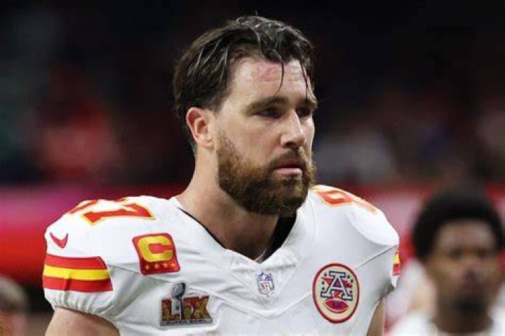 Travis Kelce's We Will Stay Taylor Signs Meaning Explained